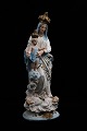 Old Madonna figure, Virgin Mary with the baby Jesus on her arm in painted plaster. Height: 46cm.