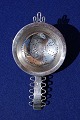 Elegant tea strainer of Danish sterling silver in a good, used condition by C.M. ...