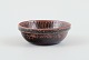 Stig Lindberg 
(1916-1982), 
Gustavsberg 
Studio hand,
miniature 
ceramic bowl.
Glaze in 
shades of ...