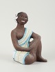 Mari Simmulson figure.Rare ceramic figure of a semi-naked Tahitian woman. ...
