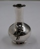 Nice and well maintained small plump vase decorated with leaves of 925 silver, in a good, used ...