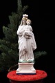 Decorative, old porcelain Madonna figure of the Virgin Mary with the baby Jesus. Height: 21cm.