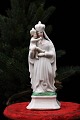 Decorative, old porcelain Madonna figure of the Virgin Mary with the baby Jesus. Height: 15cm.