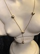 14 k Gold Necklace with four hearts on L .42 cm