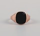 Gold ring with 
black stone, 
approx. 1960s. 
Danish 
goldsmith.
Stamped "P.NY" 
Poul Nyhagen, 
...