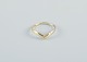 Scandinavian 
goldsmith. 
Modernist gold 
ring adorned 
with brilliant.
Stamped with 
the ...