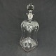 Height 28 cm.Kluk flask in clear glass with round stopper from Holmegaard.The flask is ...