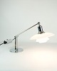 The piano lamp PH 2/1 is a unique and stylish design from 1943, created by the famous Danish ...