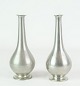Just Andersen pair of pewter flower vases with model number 1457. These vases are an elegant and ...