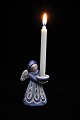 L. Hjorth 
ceramic angel 
in blue / white 
glaze holding a 
small candle. 
Height: 9,5cm. 
No.421. Is ...