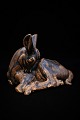 Saxbo ceramic figure of a reclining deer with fine brown glaze.Design Hugo Liisberg. H:14 cm. ...