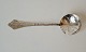 Antique Rococo 
hanging spoon 
in silver. 
Stamped the 
three towers 
1917. 
Length 16.5 
cm.