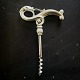 Just Andersen 
figurative 
corkscrew in 
tin. Imaginary 
mythical beast 
or serpent. 
Appears in good 
...