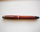Coral red 
Montblanc no. 
216 fountain 
pen. Push 
button fillser. 
Made in 
Germany. in the 
1950s. ...