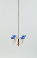Gunnar Ander 
for Ystad 
Metall. 
Chandelier for 
four candles in 
brass and 
mouth-blown art 
glass ...
