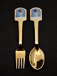 A Michelsen 
Christmas spoon 
and fork 1977 
gold-plated 
sterling silver 
item no. 521778