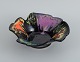Vallauris, 
France, ceramic 
bowl in 
brightly 
colored glazes 
on a black ...