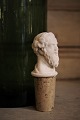 19th century 
wine stopper 
from Royal 
Copenhagen in 
the shape of a 
man's bust in 
biscuit with 
...