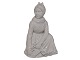 Small Royal 
Copenhagen 
figurine, blanc 
de chine Fange 
(Fanø) girl 
with flowers.
Decoration ...