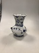 Royal 
Copenhagen Blue 
Fluted Full 
Lace Vase no. 
1197. H: 21.5 
cm (8 15/32").
Has repair on 
...