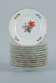 Royal 
Copenhagen, 
Light Saxon 
Flower.
Twelve plates 
of porcelain, 
decorated in 
colors and gold 
...