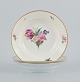 B&G, Bing & 
Grondahl Saxon 
flower.
Three deep 
plates 
decorated with 
flowers and 
gold ...