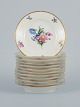 B&G, Bing & 
Grondahl Saxon 
flower.
12 cake plates 
decorated with 
flowers and 
gold ...