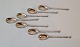 Set of 7 coffee 
spoons in 
silver 
Stamped: NCC - 
13Lod
Length 11.6 
cm.