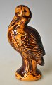 Saving bank in the shape of a standing stork, Rønne, Bornholm, 19th century. Denmark. Yellow and ...