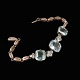 14k Gold 
Bracelet with 
Aquamarine and 
Diamonds.
Six diamonds 
of 0.03ct each.
Eight diamonds 
of ...