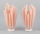 Georgia Jacobs, French designer, a pair of rose-coloured table lamps in resin on a marble ...