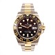 Rolex GMT Master II 18 kt gold and steeBox and papersYear 2014