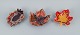 Vallauris, France, three leaf-shaped dishes in brightly colored glazes.1960/70s.In excellent ...