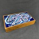 Length 21 cm.
Width 12.5 cm.
Height 4 cm.
The decoration 
on this box 
looks like an 
angel ...