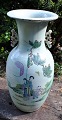 Chinese family vert baluster vase, 19th century Polychrome decorated with women in a garden, ...