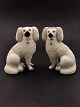 A pair of 
almost 
identical 
poodle dogs 
18.5 cm. 19.c. 
subject no. 
525254
