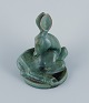 Arne Bang, ceramic sculpture, reclining deer.Glaze in shades of green and blue.Model number ...