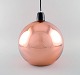 Tom Dixon (b. 1958), British designer. Round copper colored ceiling pendant. Clean design, 21st ...