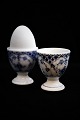 Royal 
Copenhagen Blue 
Fluted Half 
Lace egg cups. 
Decoration 
number: 1/542. 
H:6 cm. 
Dia.:5cm. ...
