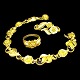 Georg Jensen; A jewelry set in 18k gold, comprising a bracelet, a brooch and a ring. Bracelet ...