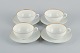 Rosenthal, Germany, a set of four large teacups and matching porcelain saucers. Thin white ...
