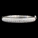 A 18k white gold bangle with diamonds, total app. 1,52 ct.  Set with 20 brillant-cut diamonds ...