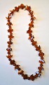 Rarely designed amber chain with round and crescent pieces, 20th century Denmark. Length: 53 ...