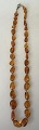 Amber chain, polished pieces, 20th century. Denmark. Length: 54 cm.Really nice chain.