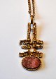 Finnish bronze pendant with chain, 20th century. Pendant decorated with red stone. Stamped: Made ...