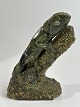 Chameleon figure, African Shona sculpture, Zimbabwe. Signed C. Tandi. The figure is cut in ...