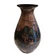 Danico; A big pottery vase.Decorated with a brown glaze, decorated with blue, green and coral. ...