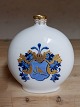 Pill-shaped Royal Copenhagen vase in porcelain with decorated noble coat of arms in overglaze. ...