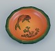 Ipsens, 
Denmark, dish 
with fish with 
glaze in 
orange-green 
shades.
Model number 
...