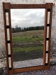 Mirror in rosewood frame with glass decoration. Danish modern from the 1970s. Dimensions: 118x76 cm